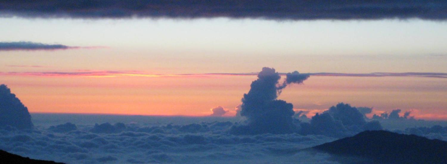 view of sky and clouds from NOAA&#039;s Mauna Loa Atmospheric Baseline Observatory, which sits at 11,140 feet, on top of Hawaii&#039;s tallest volcano.