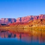 Canyon reflects in water along the Colorado River