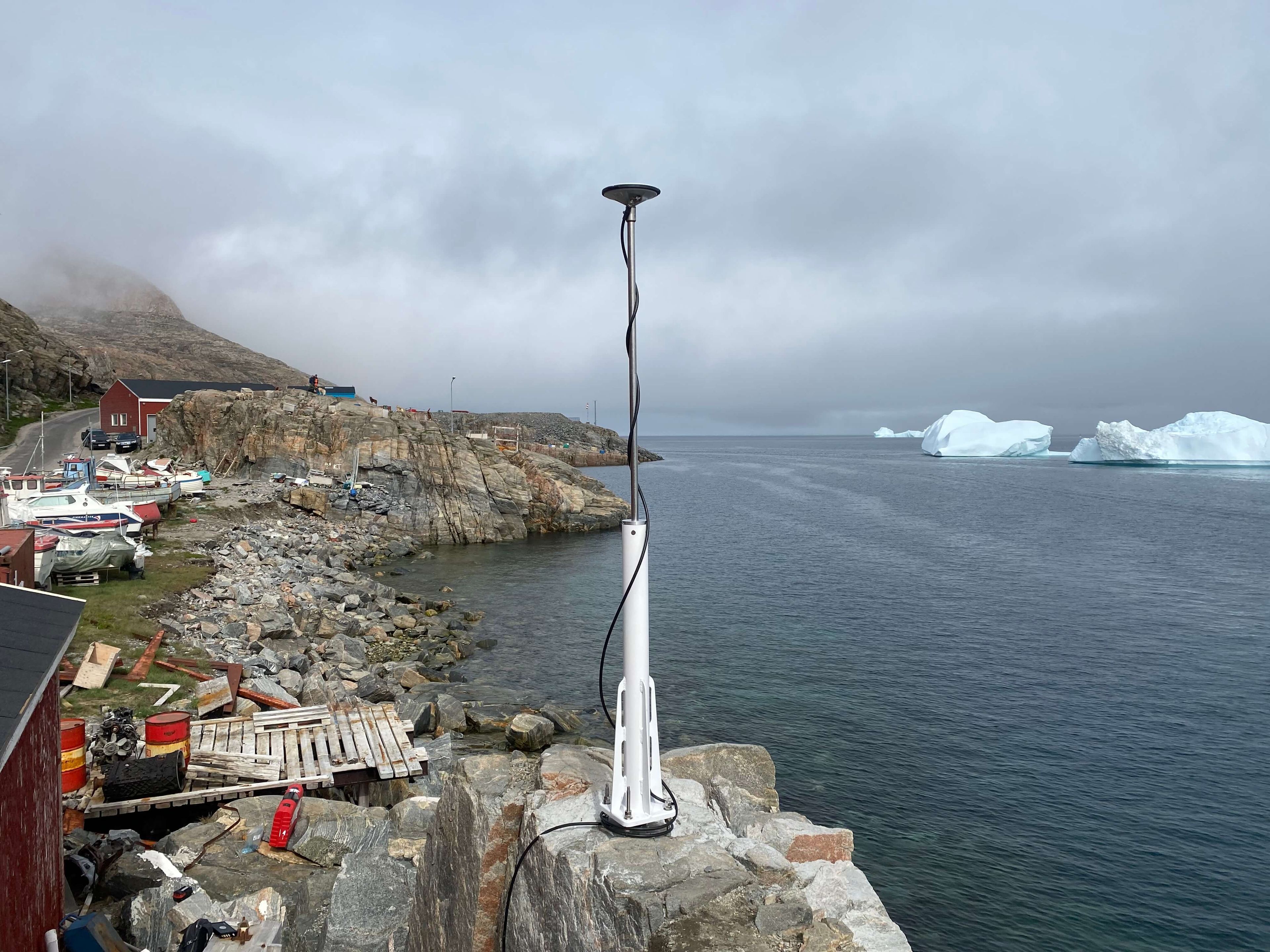 Coast with a tall instrument on a rock