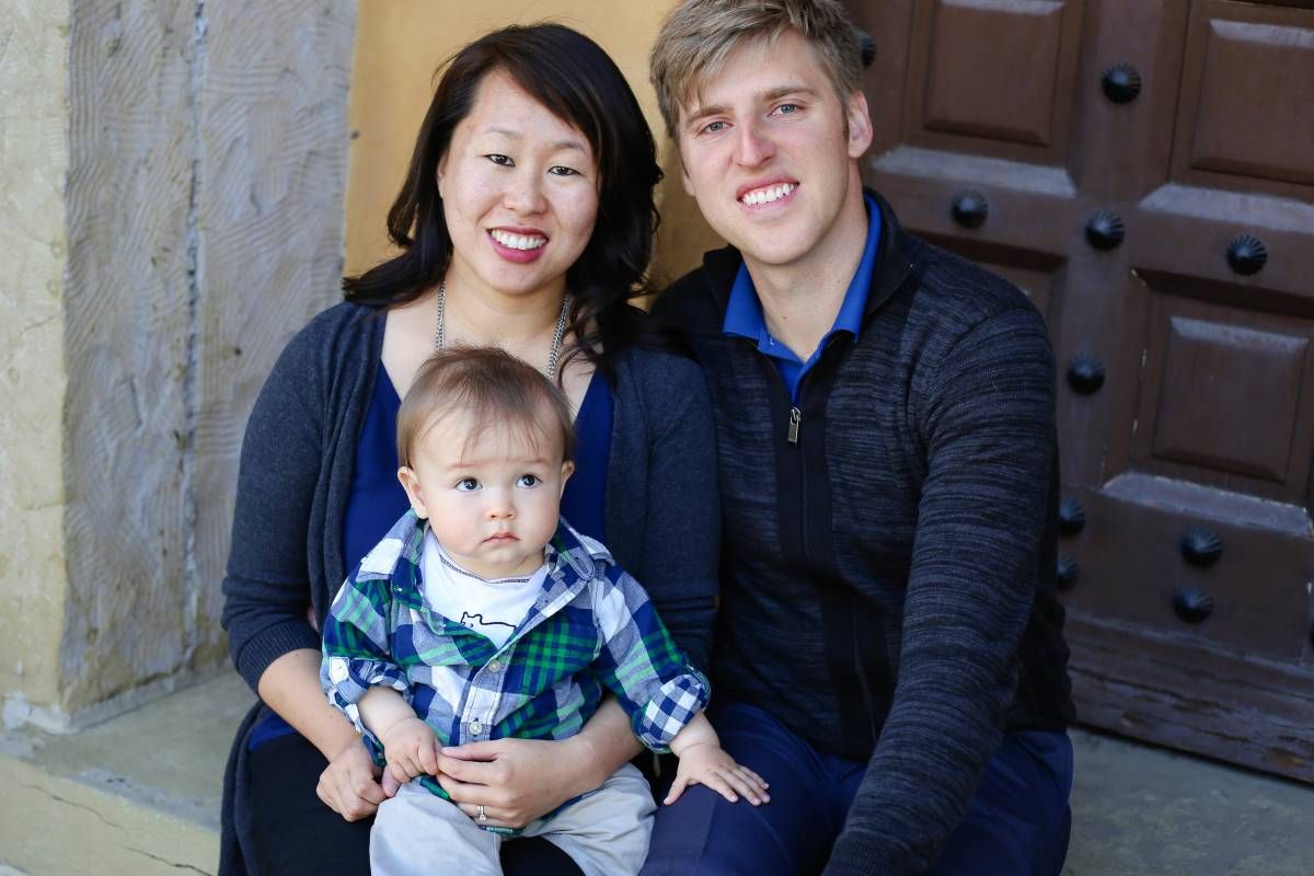 Burgess with his wife and son