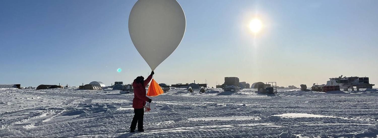 Bailey Nordin launches a weather balloon