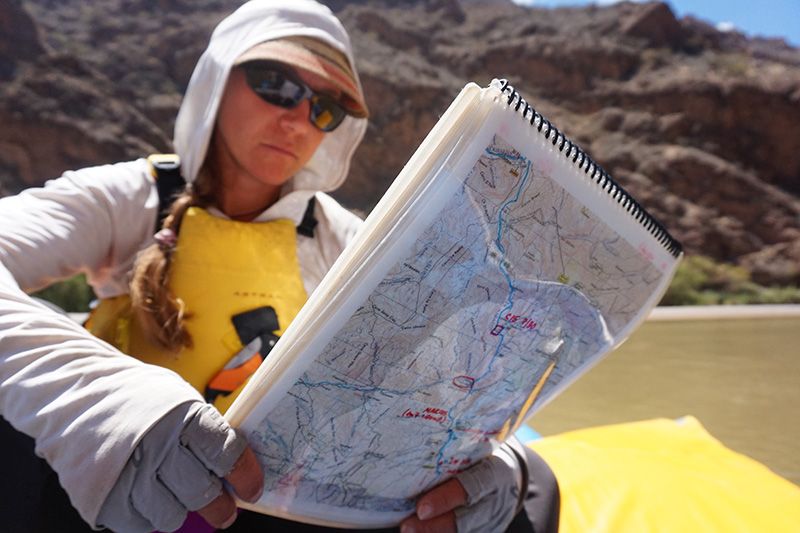 Alice Hill Checks a Map in the Field