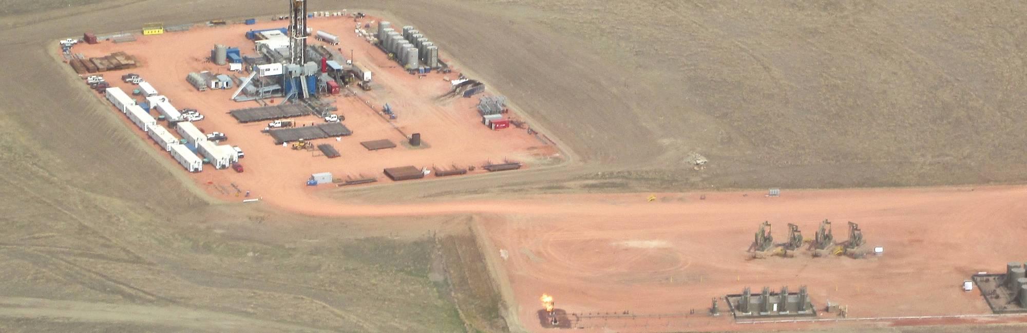 drill rig and tons of equipment on the ground in north dakota