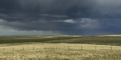 Dark foreboding skies span over northern region grasslands