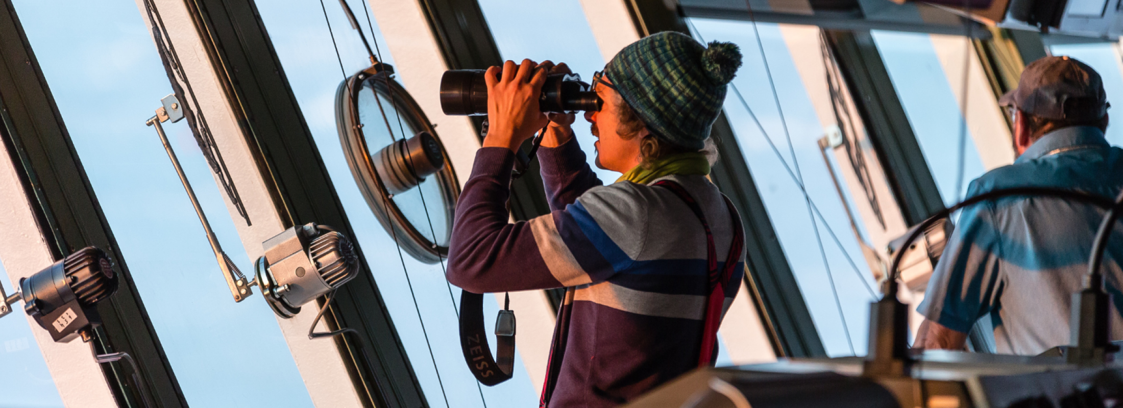 MOSAiC crew member with binoculars
