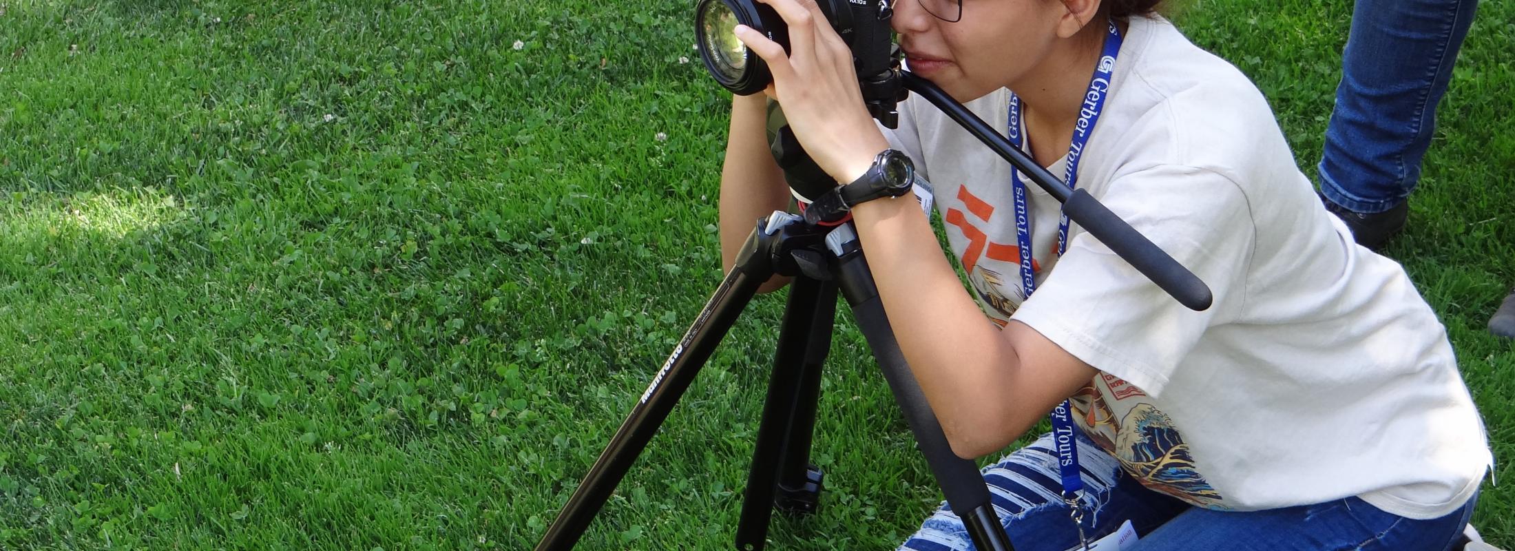 Woman positioning camera